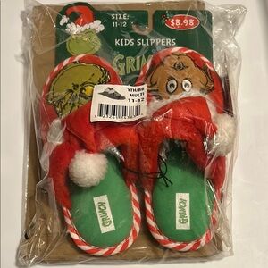 Grinch kids slippers. Tag says boys, but can be unisex.
New with tags.